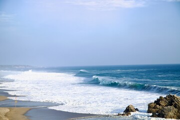 waves crashing on rocks