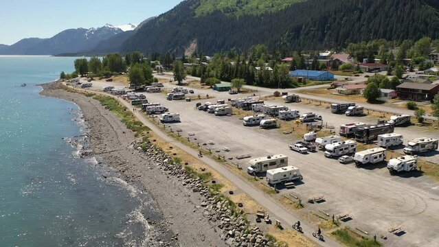 Aerial view of port city Seward, Alaska.  Campground, travel trailers, RVs parked along the coastline. 