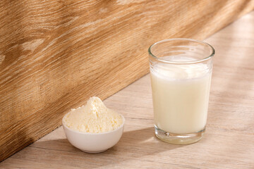 Glass of dehydrated milk powder with nutrients