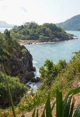 Beautiful view point of tropical sea and island with mountain cliff and rocks in Noen Nangphaya View Point in Chanthaburi, Thailand.