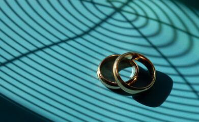wedding rings on the table. Golden. Wedding ring. Romance. Wedding. 