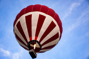 Hot air balloon rising in the sky 