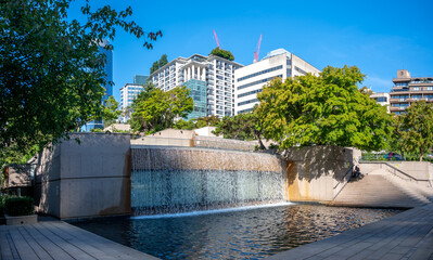 Vancouver, British Columbia - July 23, 2022: Beautiful fountain at Robson Square in downtown Vancouver.