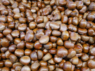 Pile of chestnuts for sale on street food.