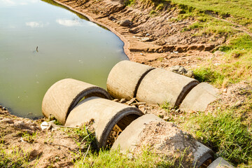 concrete drainage pipe  Collapsed after the storm calmed down. Concept, non-standard construction,...