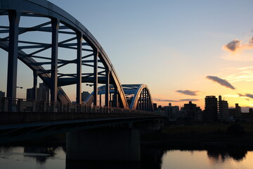 tama river bridge at sunset