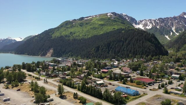 Aerial view of port city Seward, Alaska.  Campground, travel trailers, RVs parked along the coastline. 