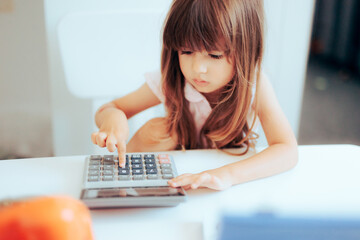 Little Girl Having a Play Pretend Office and as an Accountant. Smart toddler child learning about...