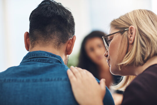 Counseling, therapy and support for sad husband and wife. .Caring, loving and kind woman consoling and supporting her partner in a difficult conversation with a therapist or psychologist