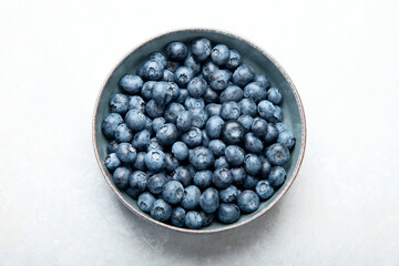 Fresh blueberry on neutral background.