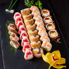 tasty sushi on the black background