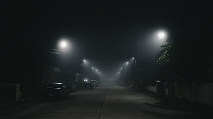 Street night scene with fog background in the village and silent town concept - Powered by Adobe