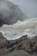 Breathtaking and impressive panoramic view of Glaciar Martial glacier close to Ushuaia, Patagonia in Argentina, enframed by lush vegetation and green trees during summer while hiking