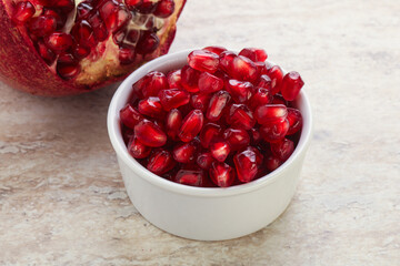 Ripe red Pomegranate seeds in the bowl