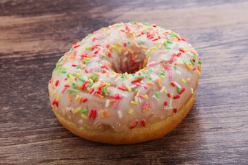 Sweet glazed vanilla donut with icing