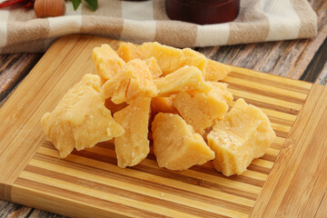 Crushed hard parmesan cheese pieces