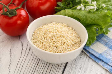 Raw sesame seeds in the bowl