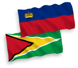 Obraz premium National vector fabric wave flags of Liechtenstein and Co-operative Republic of Guyana isolated on white background. 1 to 2 proportion.