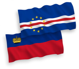 National vector fabric wave flags of Liechtenstein and Republic of Cabo Verde isolated on white background. 1 to 2 proportion.