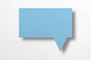 Fototapeta na wymiar Speech balloon shaped blue paper isolated on white background.