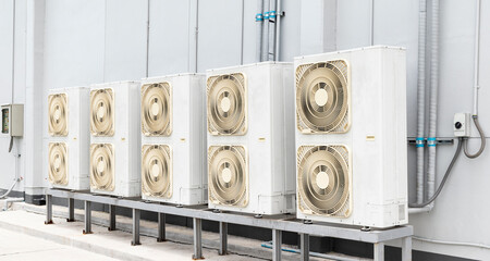Air compressor on rooftop building