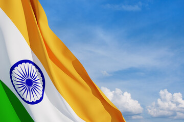 Waving India flag on blue cloudy sky. Background with place for your text. Indian independence day,...