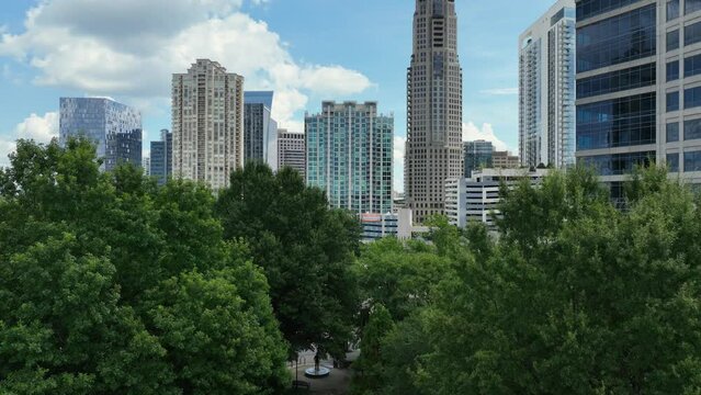 Aerial approach towards high rise condos in Buckhead.