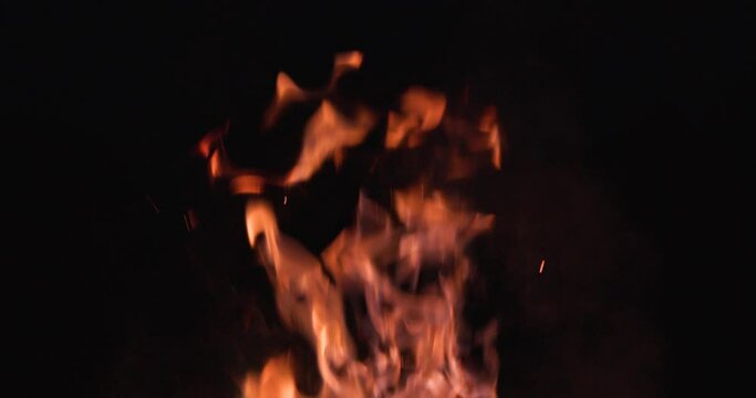 slow motion of flames burning towards the sky.