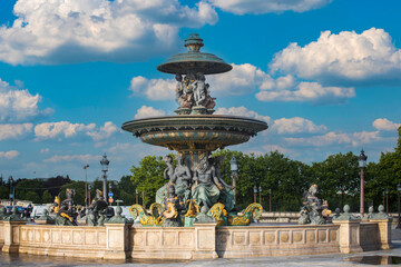 Fototapeta na wymiar The fountain of the seas of the Place of Concorde in Paris, one of the oldest and most historic squares in France, is located next to the ancient Egyptian obelisk which attracts millions of tourists.