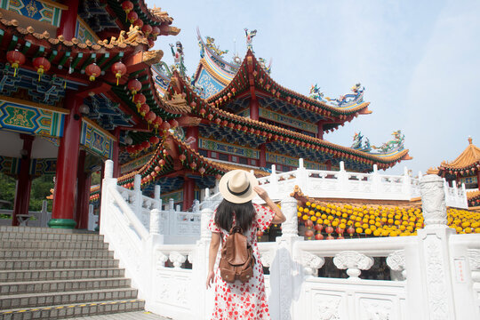 Woman tourist is sightseeing and traveling inside Thean Hou Temple in Kuala Lumpur, Malaysia.
