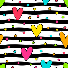 Bright multicolored hearts and small circles on a striped black and white background. Vector seamless pattern.
