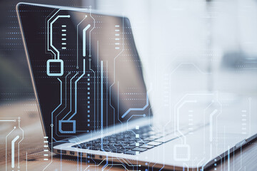 High-tech sensor circuit board panel. Close up of laptop with hologram. Technology and digital...