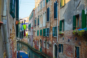 Fototapeta na wymiar Canal through a residential area of Venice