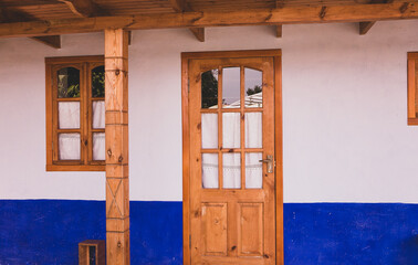 Rural house made of clay and clay roof. The ideal country house for rest and relaxation in the bosom of nature