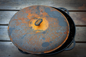 Rusty cast iron cooking bowl