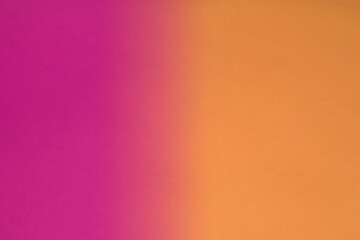 Dark vs light abstract Background with plain subtle smooth de saturated  pink orange yellow colours parted into two
