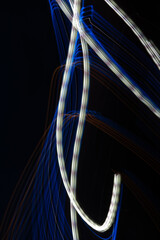 Beautiful Abstract futuristic painting color texture with lighting effect. Modern dynamic shiny pattern. Fractal graphic artwork design. Creative long exposure photography. Abstract lights at night.