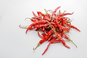 Dried red chili or chilli cayenne pepper isolated on white background cutout. is spicy than fresh...