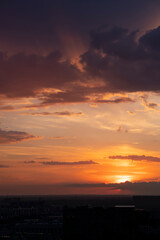 Orange sky at sunset after rain in Kazakhstan. High quality photo