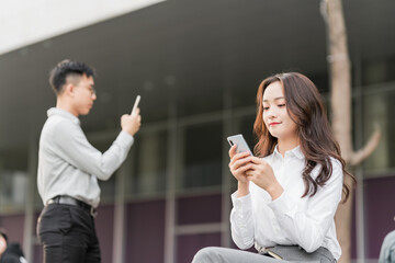 Asian business men and women working partners outdoors