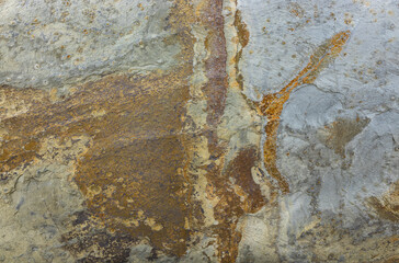 Grunge rusty background with corrosion and deep crack on the texture of the surface