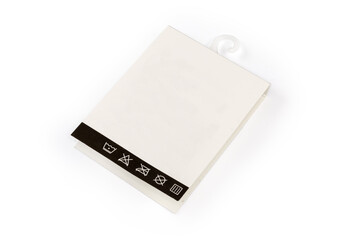 Folded white carton hanging tag on a plastic hook