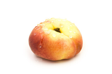 Ripe organic fig peach in dew drops isolated on white background.