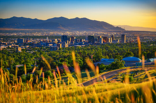 Salt Lake City skyline at sunset with Wasatch Mountains in the background, Utah