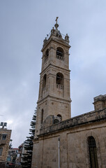 Fototapeta na wymiar The Bell tower of Virgin Mary Orthodox Church at Bethlehem