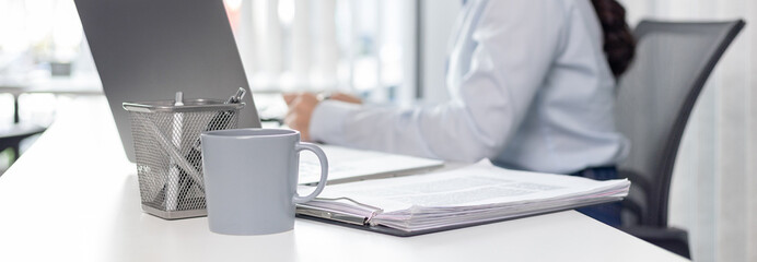 Blurred image of a businesswoman, Asian businesswoman using laptop to private office at home, Freelancers work, Online communication, VDO Call , Home lifestyle.