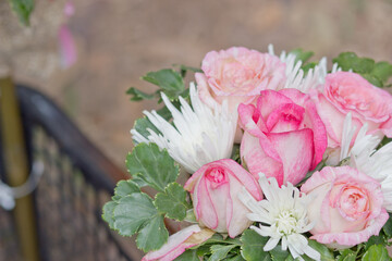 Close up view of a beautiful bouquet of mixed coloful flowers . The concept of a flower shop and flower delivery as a family business, florist work.