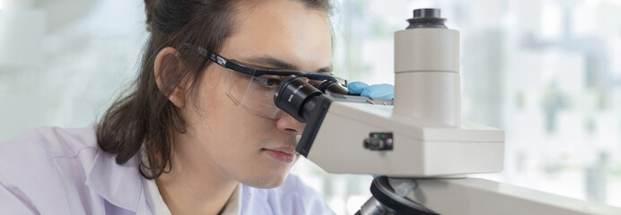 Scientists or researchers perform microscopic endoscopy to examine changes in the chemical reactions and degradation of cells, Lab experiments, Researchers scientist working analysis with test tube.