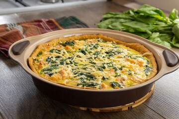 salmon pie on a wooden background. food concept.