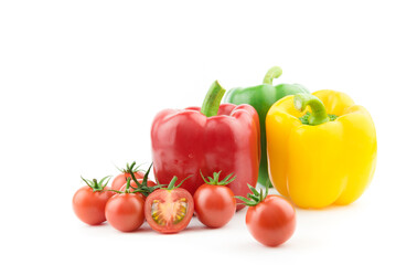 sweet peppers and tomatoes on a white background